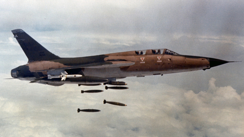 F-105 dropping bombs mid flight