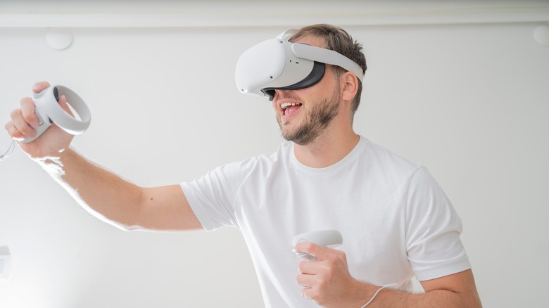 Man wearing a Meta Quest 2 VR headset