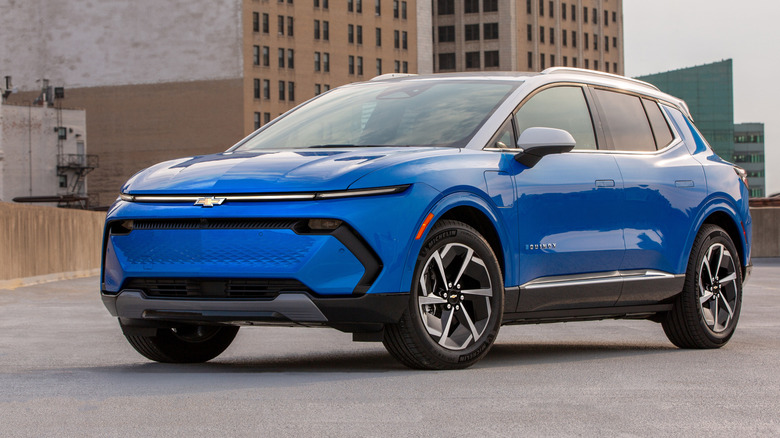 Chevy Equinox EV on top of parking garage