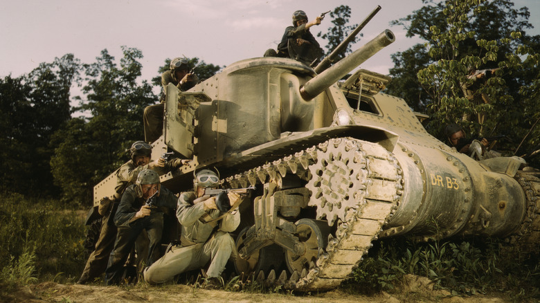 M3 Lee Tank and armed personnel