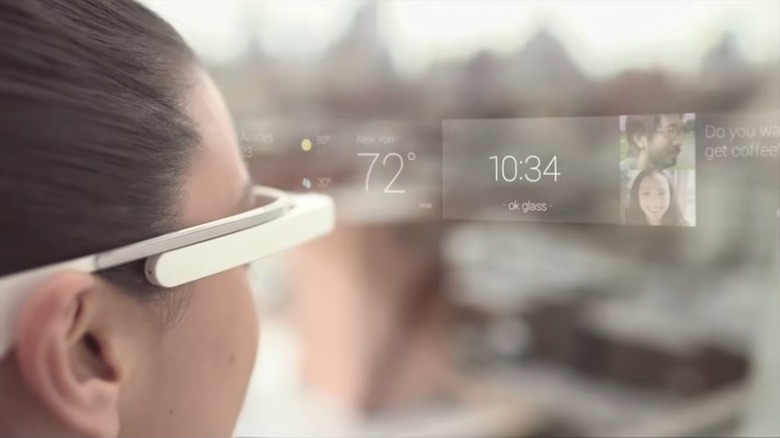 woman checking notifications with Google Glass
