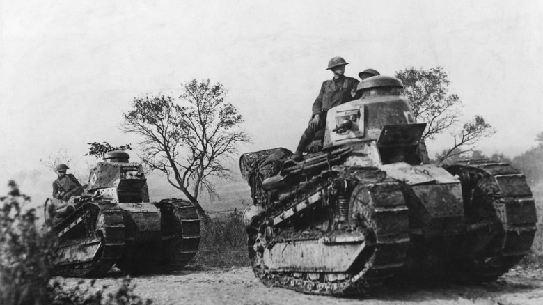 Soldiers driving Renault tanks