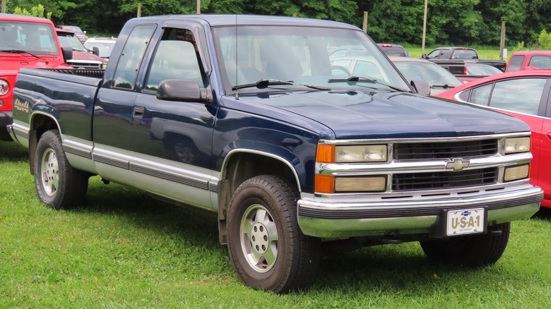 Blue Chevrolet Silverado K1500 parked at a car show