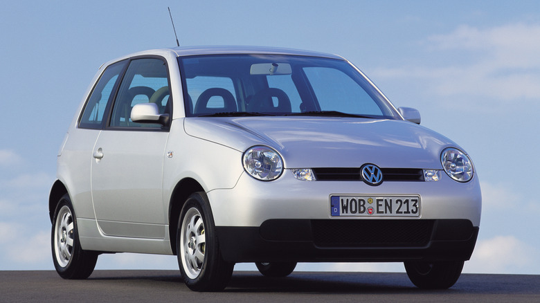 The original Volkswagen Lupo in silver, front 3/4 view