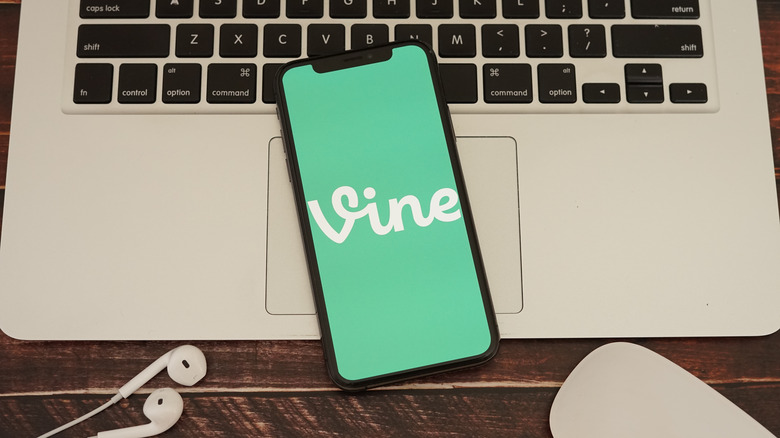 Vine app on a smartphone placed on a laptop