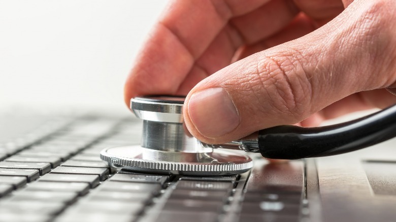 stethoscope on laptop