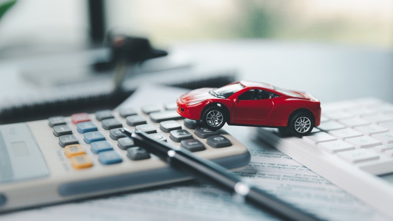 Miniature car on a calculator 