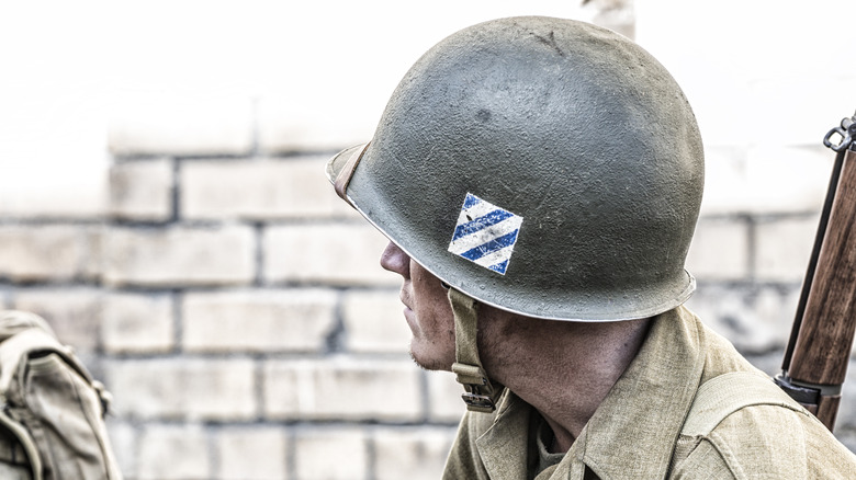 Soldier looking away with helmet on