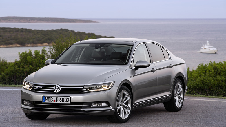 The B8 Volkswagen Passat in silver, front 3/4 view, pre-facelift