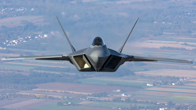 A U.S. Air Force F-22 Raptor fighter jet flying over Poland.