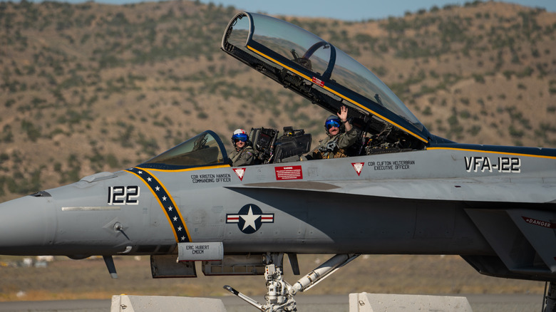 A pilot and a weapons officer in an F/A-18 Super Hornet.