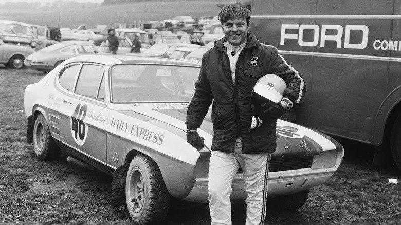 Roger Clark posing with Ford Capri 4WD