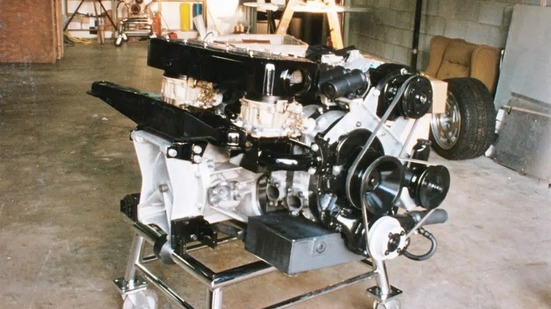 Wankel rotary engine on garage stand 