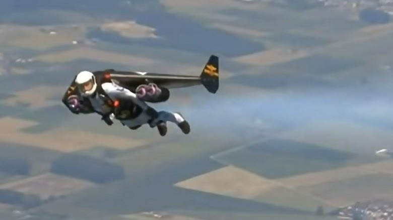 Yves Rossi flying at high altitude