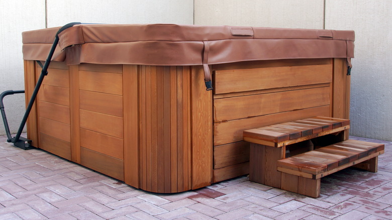 Brown hot tub with cover