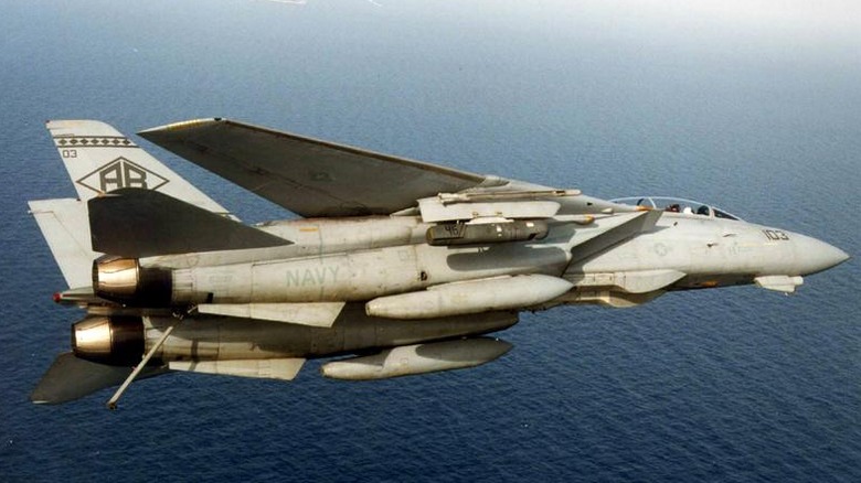 F-14 Tomcat banking left over the ocean