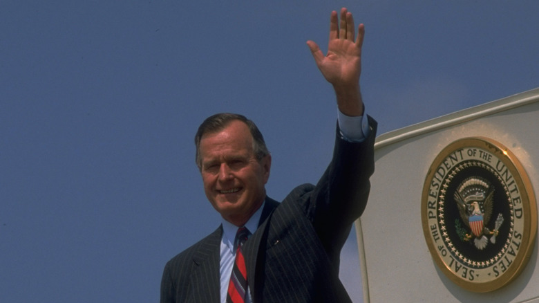 George H.W. Bush exiting Air Force One