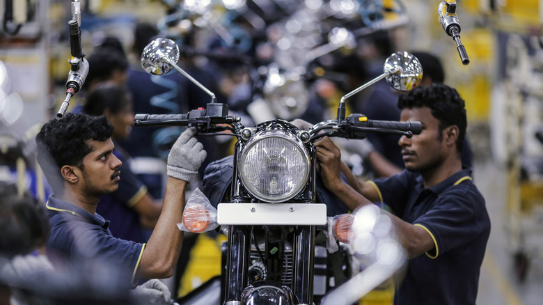 Royal Enfield employees assemble Classic 350 motorcycles in Chennai, India