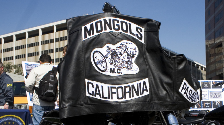 Mongols mc color hanging from motorcycle