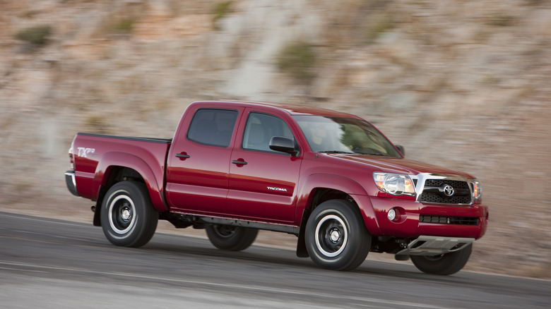 2nd Gen Toyota Tacoma driving at speed on an open road