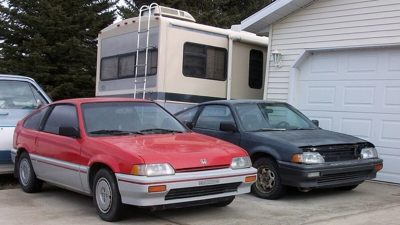 Two Honda CR-X models parked together