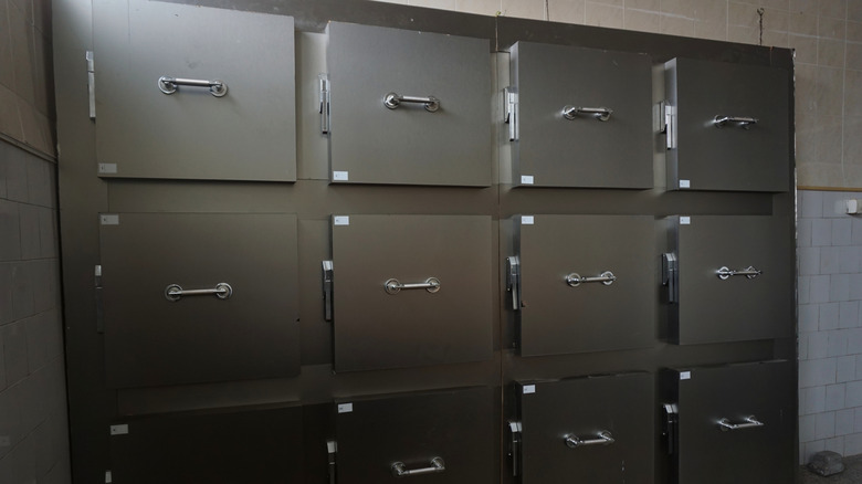 Shelves for cadavers in morgue