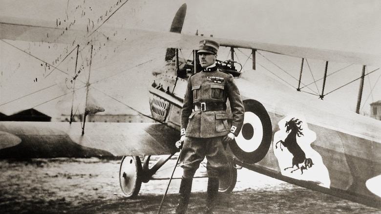 Count Francesco Baracca standing by his SPAD XIII