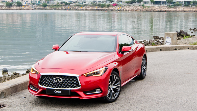 Infiniti Q60 parked waterfront