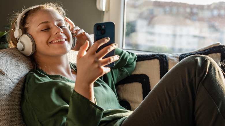 iphone user with headphones