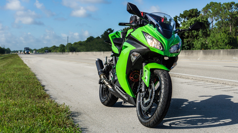 Green Kawasaki Ninja 300 motorcycle