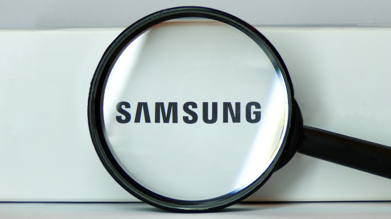 Samsung logo under magnifying glass
