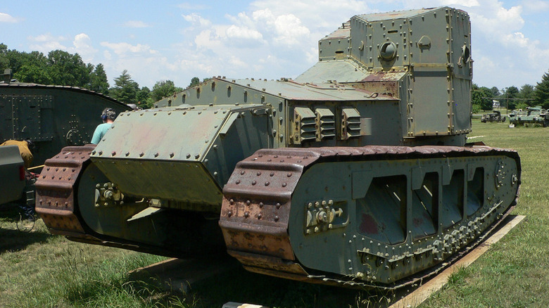 Medium Mark A Whippet tank parked outside