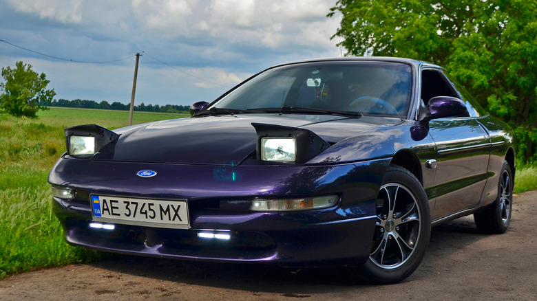 Restored Ford Probe in grassy park