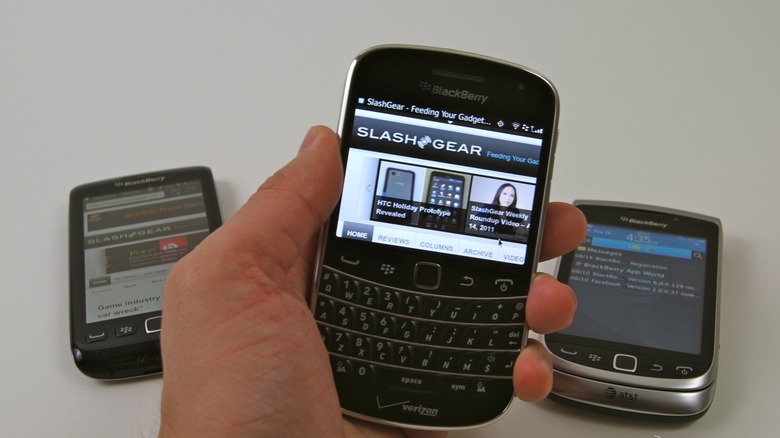 Man holding BlackBerry Bold Touch