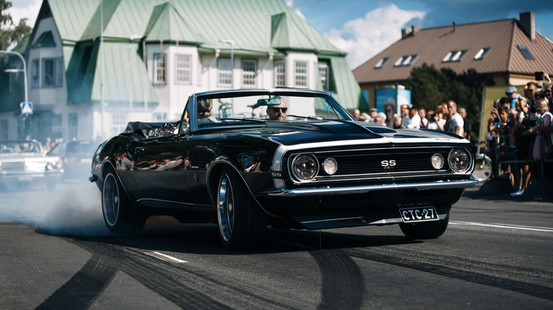 Black 1967 Chevrolet Camaro with white trim