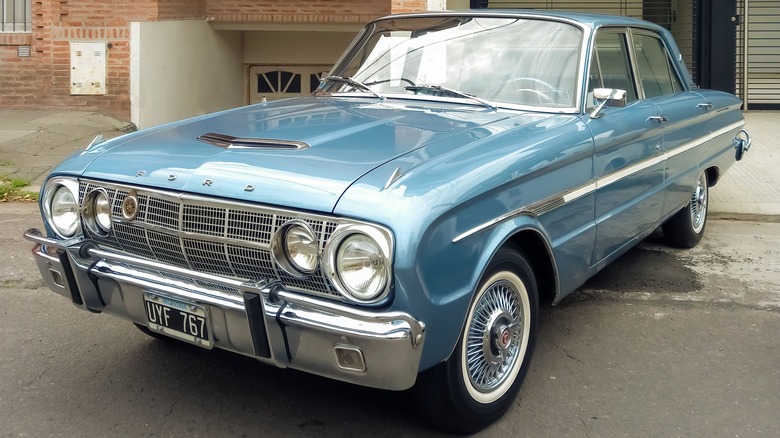 Ford Falcon parked outside house