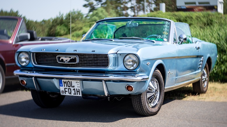 1965 Ford Mustang in parking lot