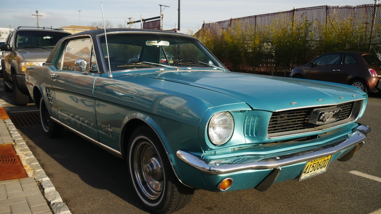 1960s Ford Mustang parked on street