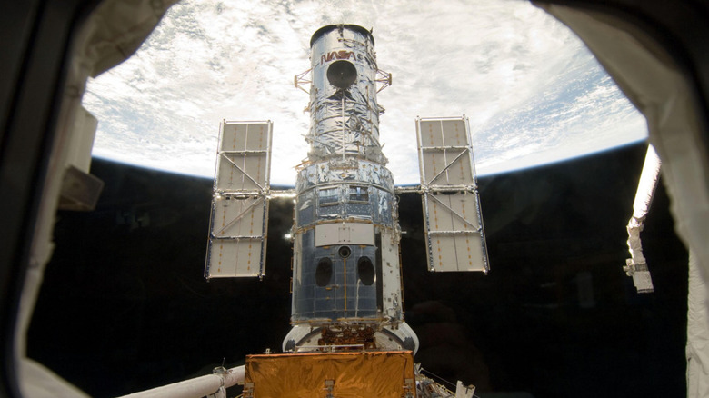 The crew of STS-31 launches the Hubble Space Telescope