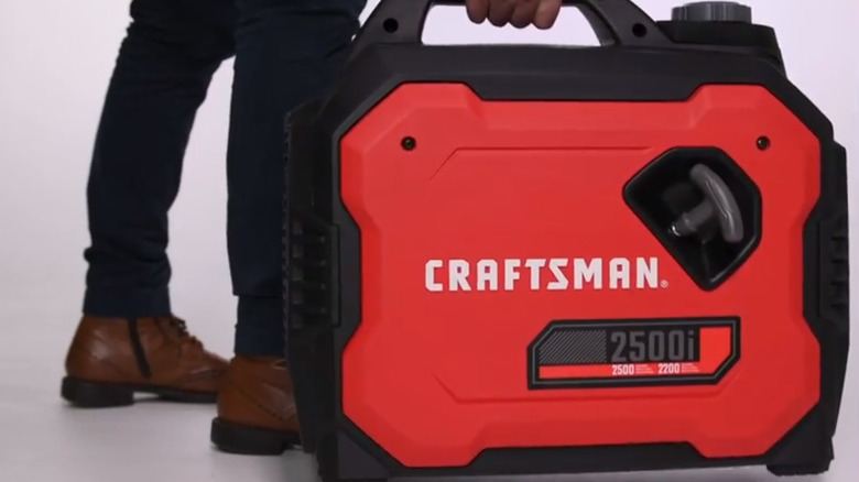 Carrying Craftsman generator by handle