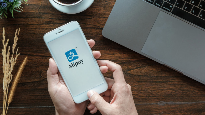 AliPay app logo on phone