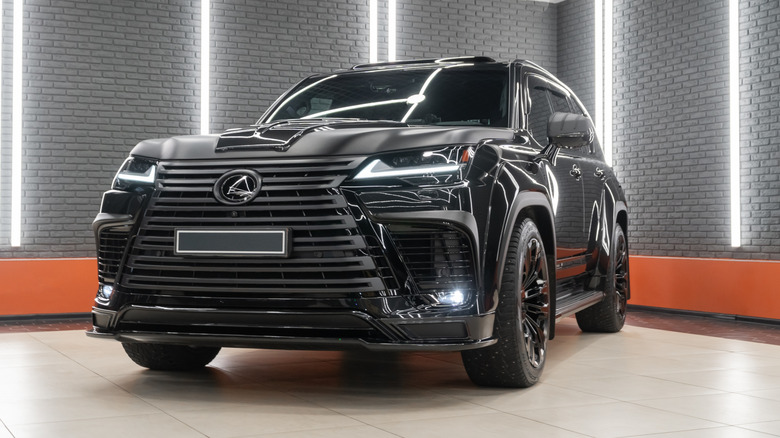 A Lexus SUV at a trade show