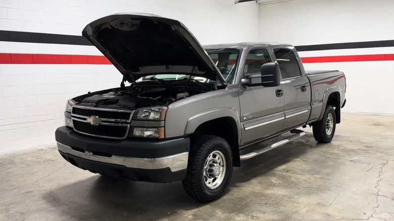 Silver 2006 Chevrolet Silverado 2500 HD parked in garage