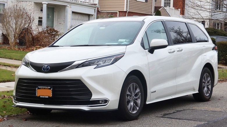 White Toyota Sienna parked street