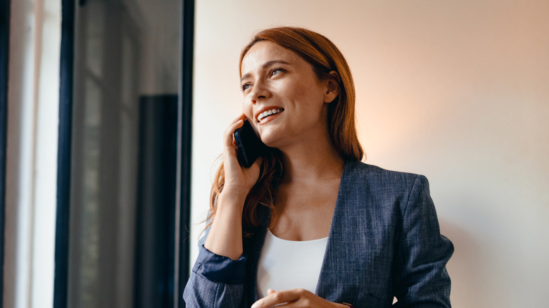 Woman talking on iPhone