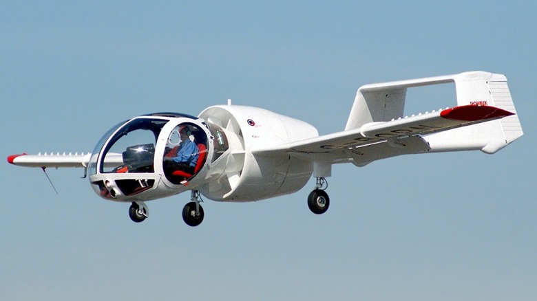 Brooklands-Aerospace Optica Srs 301 flying over blue skies with a lone pilot