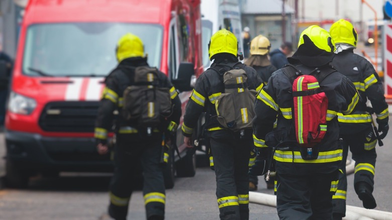 firemen walking down the street