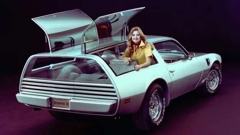 Rear view of  Pontiac Firebird Type K concept car with side gull-wing doors open