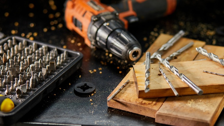 A drill with different types of drill bits.