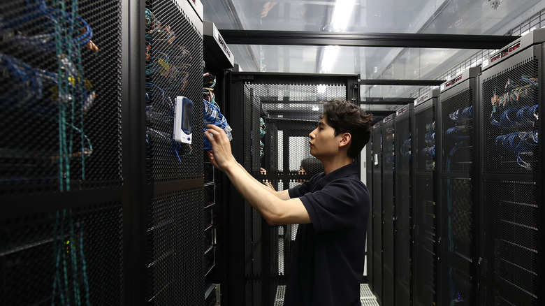 Man working in server farm